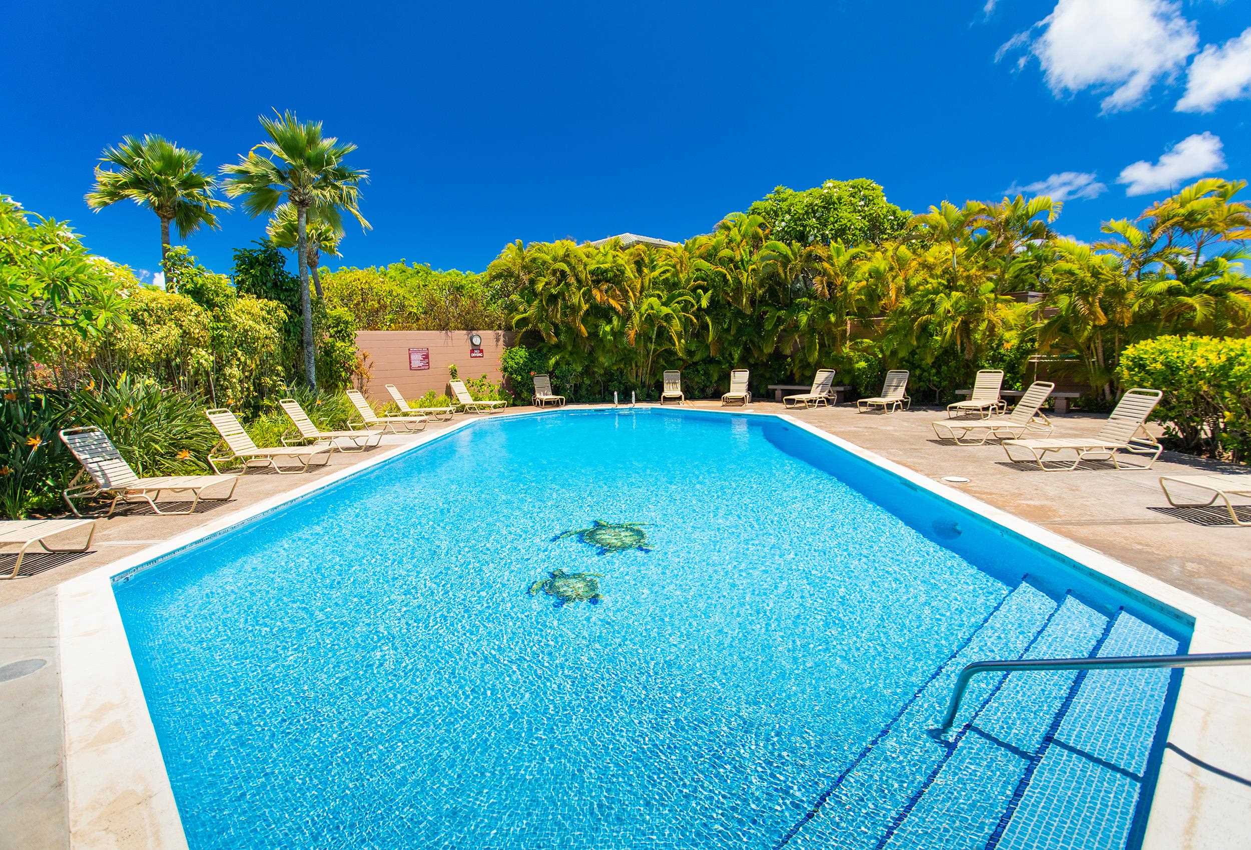 100 Ridge Road, Unit 723 Lahaina, HI 96761 - Photo 36 of 48 a view of a swimming pool with a yard