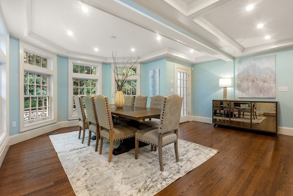 61 Possum Road Weston, MA 02493 - Photo 11 of 42 a view of a dining room with furniture and wooden floor