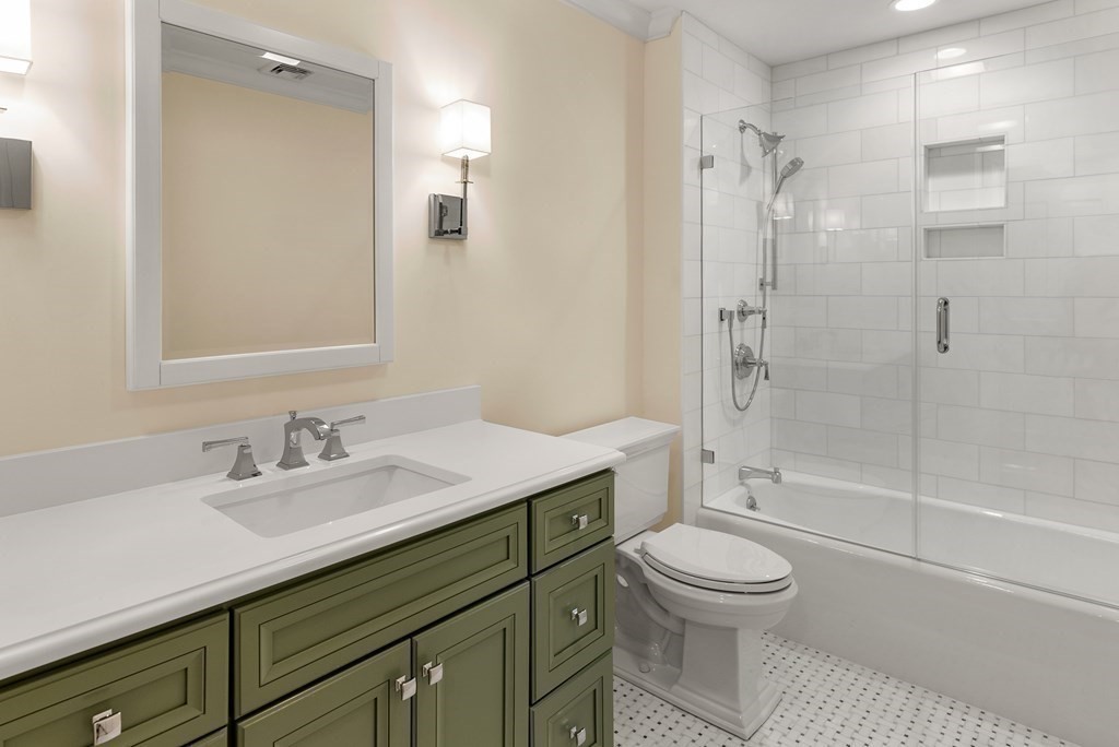 61 Possum Road Weston, MA 02493 - Photo 28 of 42 a bathroom with a sink a toilet and shower