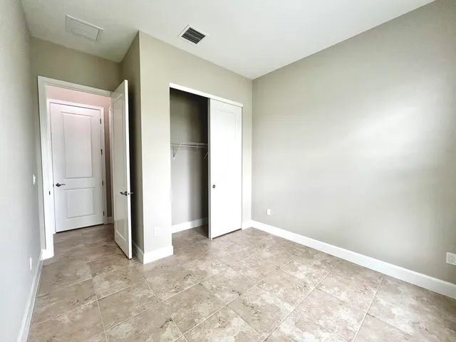 an empty room with a natural light