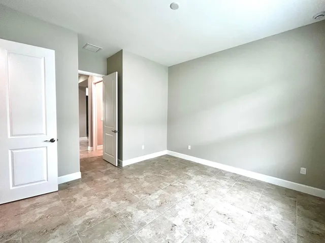 an empty room with a natural light