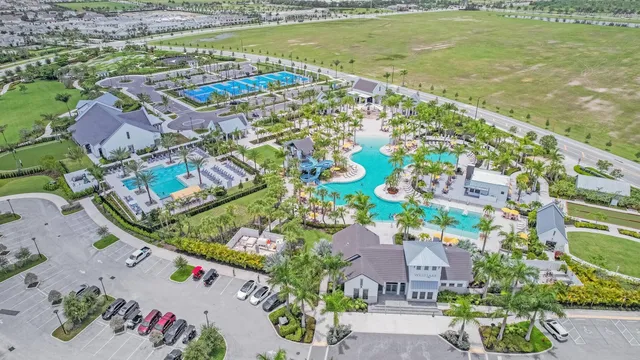 an aerial view of a house with a ocean view