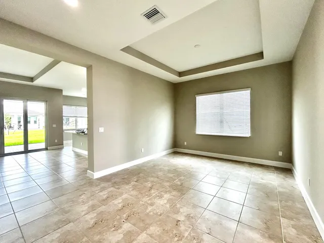a view of an empty room and window