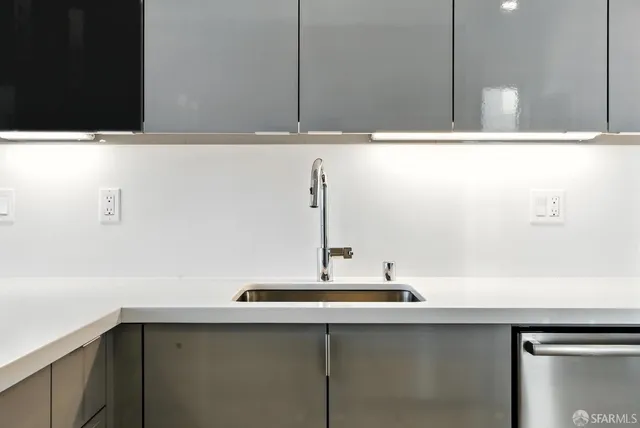 a bedroom with a large bed and a large window