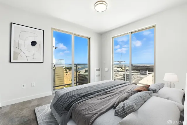 a bathroom with a double vanity sink mirror and toilet