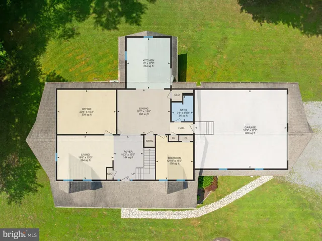 a view of a dining room with furniture and a chandelier