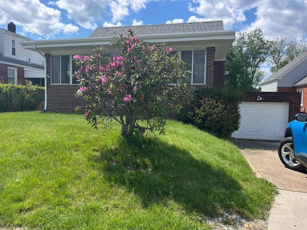 314 Terrace McKeesport, PA 15135 - Photo 3 of 19 a view of a house with garden and patio