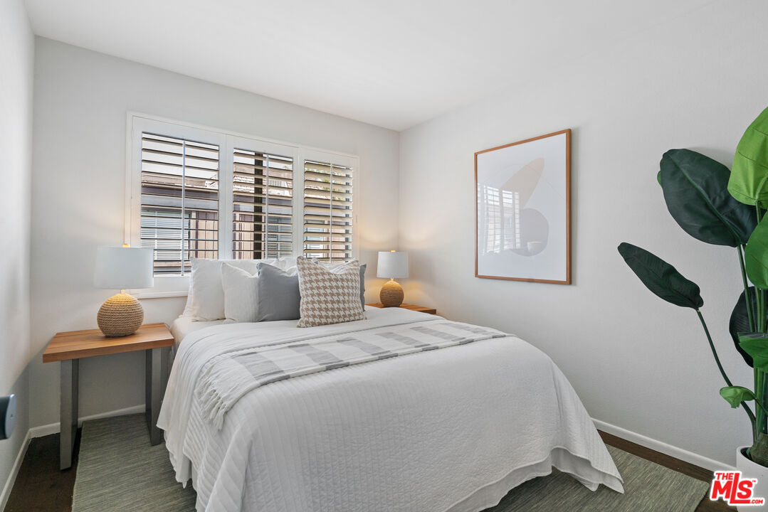 4421 Alla Road, Unit 3 Marina del Rey, CA 90292 - Photo 20 of 31 a bedroom with a bed and window