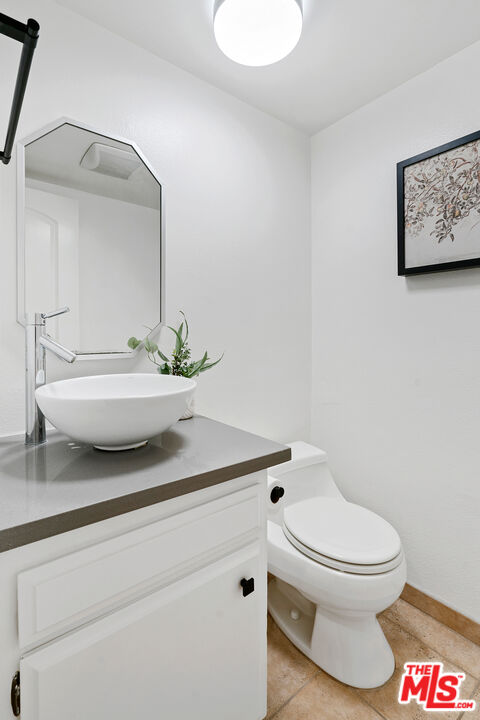 4421 Alla Road, Unit 3 Marina del Rey, CA 90292 - Photo 10 of 31 a bathroom with a sink a toilet and a mirror