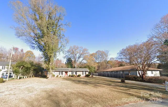 a view of road and trees