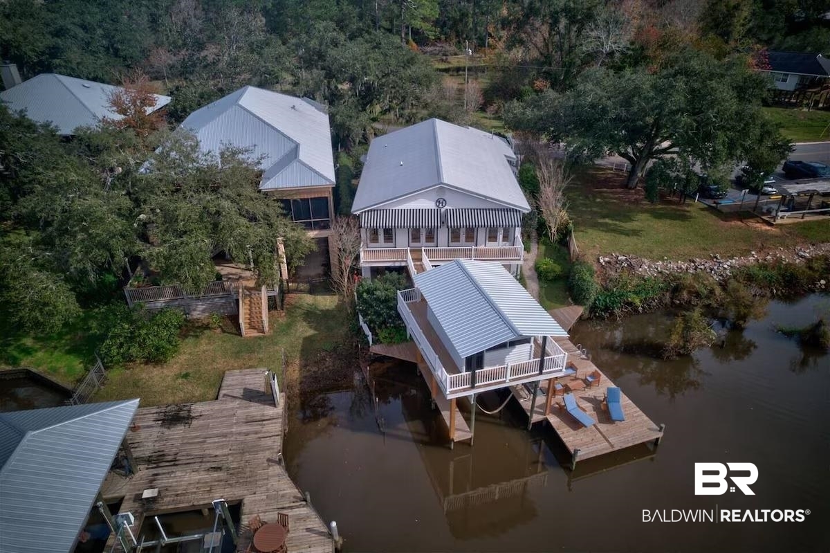 16297 Honey Road Summerdale, AL 36580 - Photo 1 of 24 Waterfront property with a covered dock and boat lift