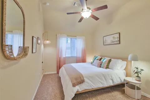 a bathroom with a sink double vanity and a shower