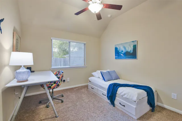 a room with furniture and a chandelier