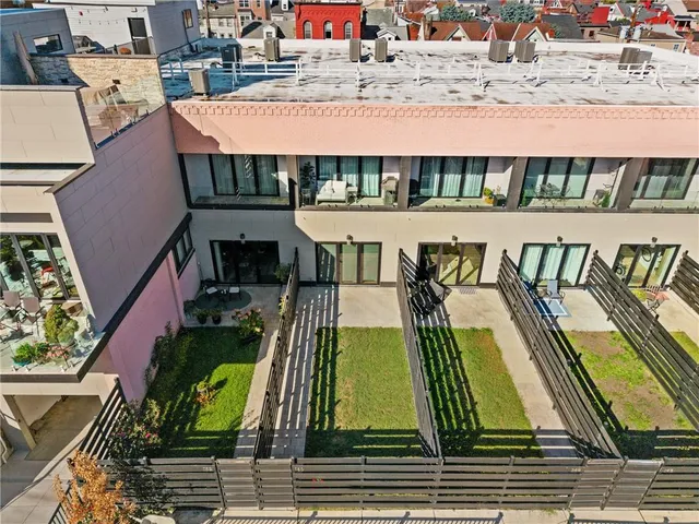 a view of swimming pool with a patio and a yard