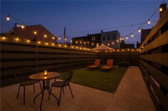 a view of a chairs and tables in patio
