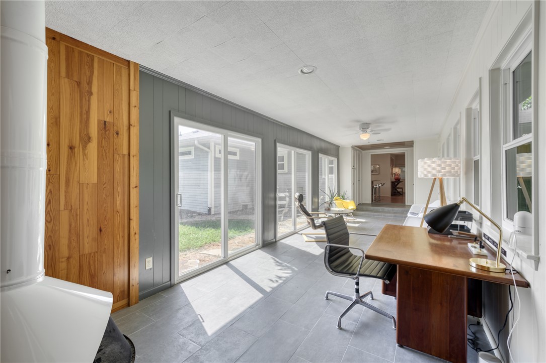 1524 Highway 159 Bellville, TX 77418 - Photo 21 of 33 a view of a workspace with furniture and a window