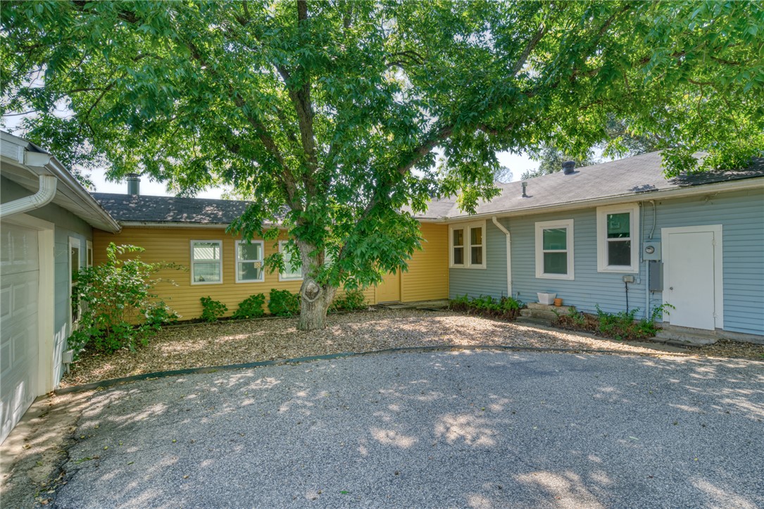 1524 Highway 159 Bellville, TX 77418 - Photo 23 of 33 a view of a house with a yard