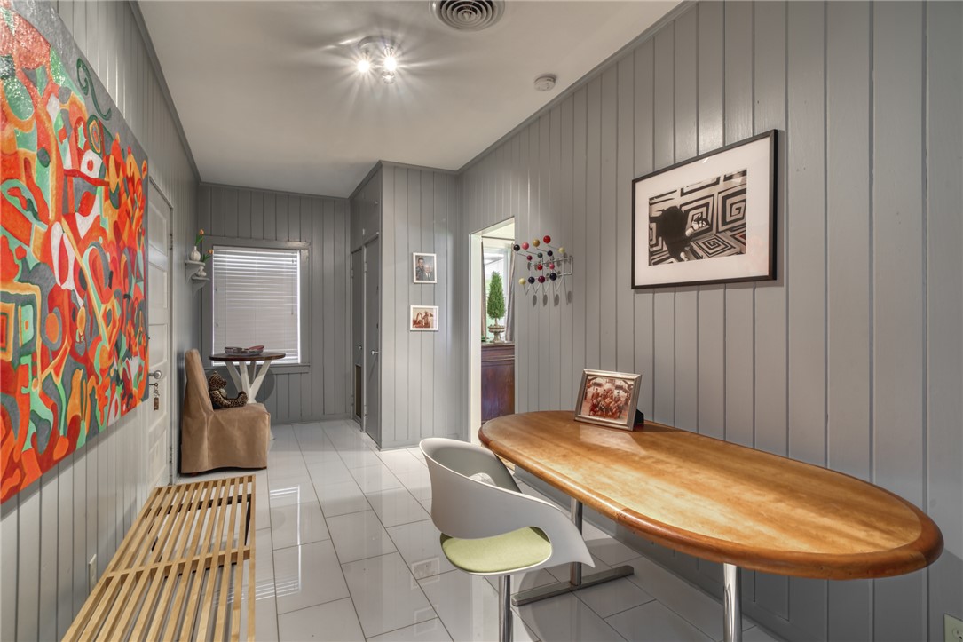 1524 Highway 159 Bellville, TX 77418 - Photo 5 of 33 a bedroom with a bed and a chandelier