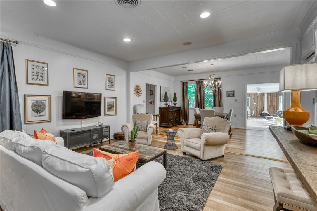 1524 Highway 159 Bellville, TX 77418 - Photo 6 of 33 a living room with furniture and a flat screen tv