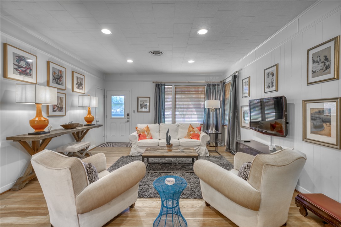 1524 Highway 159 Bellville, TX 77418 - Photo 7 of 33 a living room with furniture and a flat screen tv