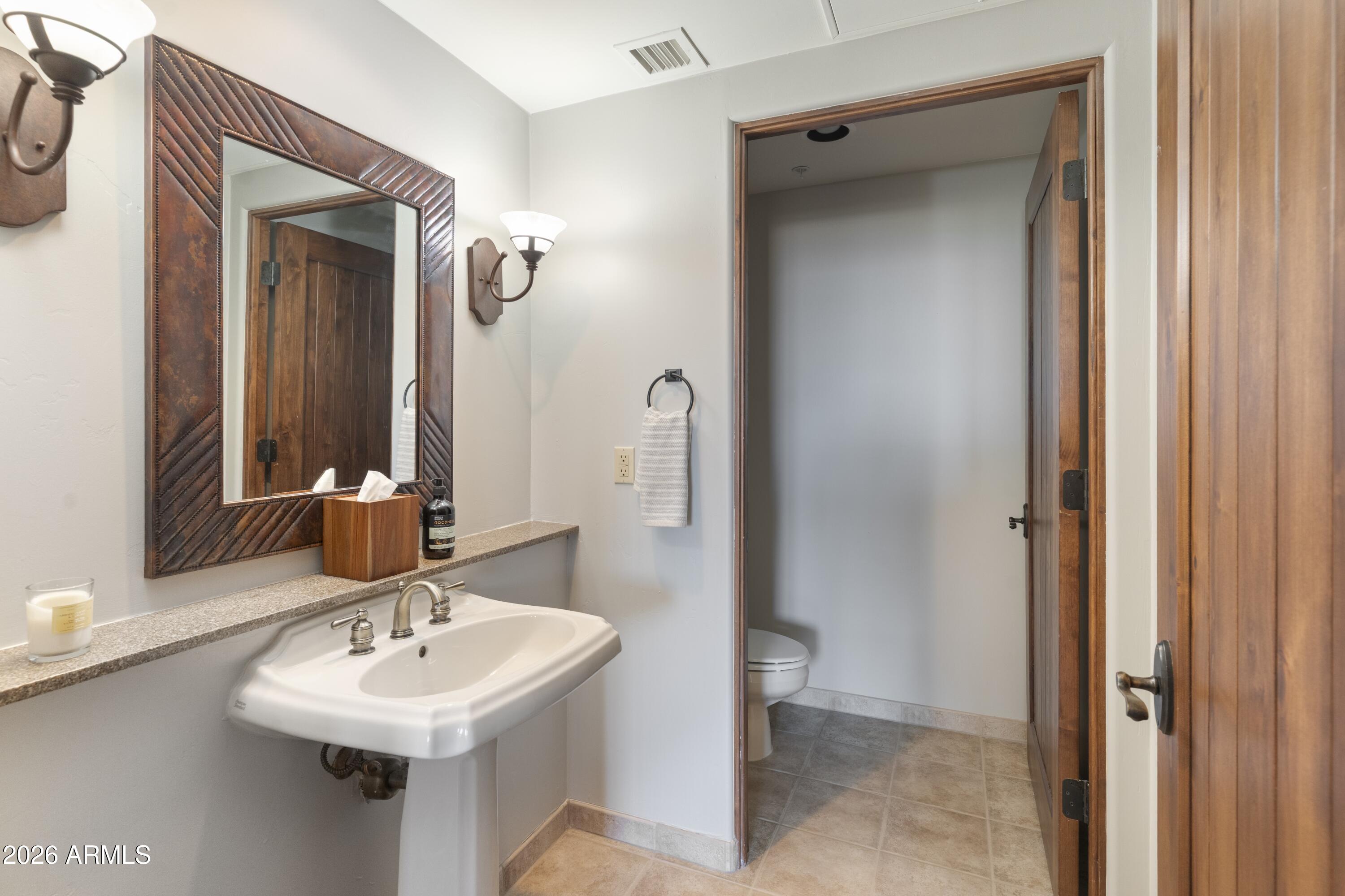 36601 North Mule Train Road, Unit C21 Carefree, AZ 85377 - Photo 11 of 28 Guest Bathroom