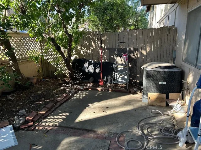 a view of a workspace with furniture