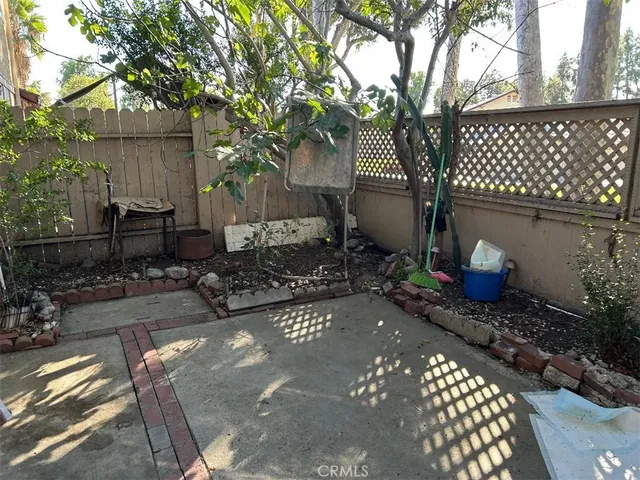 a kitchen with stainless steel appliances a stove a sink and a microwave