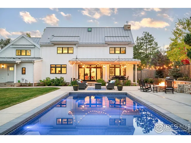 a view of a house with a swimming pool