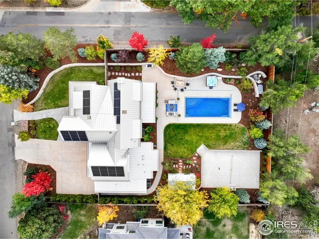 an aerial view of house with yard