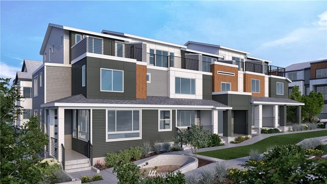 a front view of a house with garden and porch