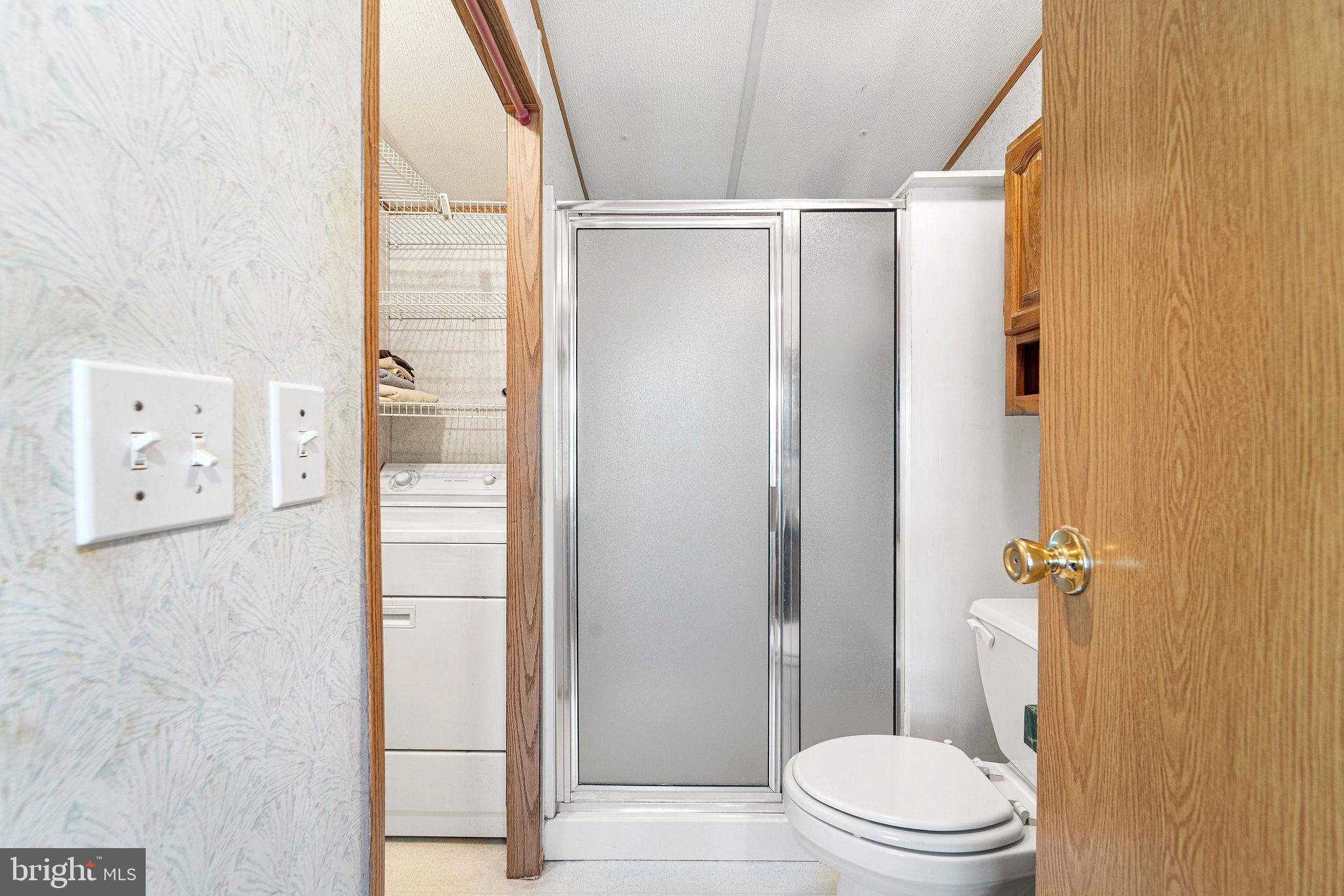 155 Whippoorwill Way Mantua, NJ 08051 - Photo 21 of 23 a bathroom with a shower and a toilet