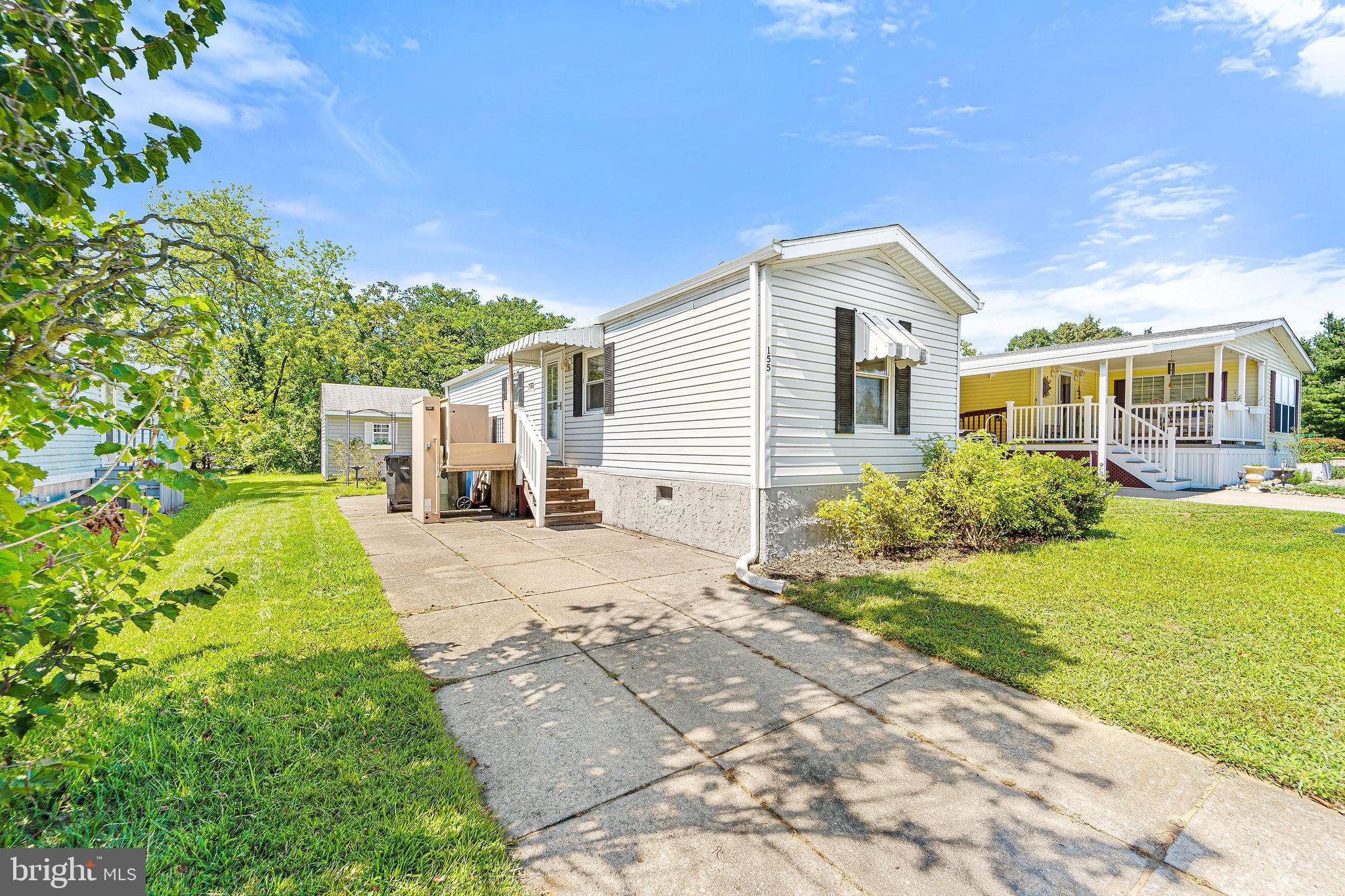 155 Whippoorwill Way Mantua, NJ 08051 - Photo 3 of 23 a view of a house with a yard