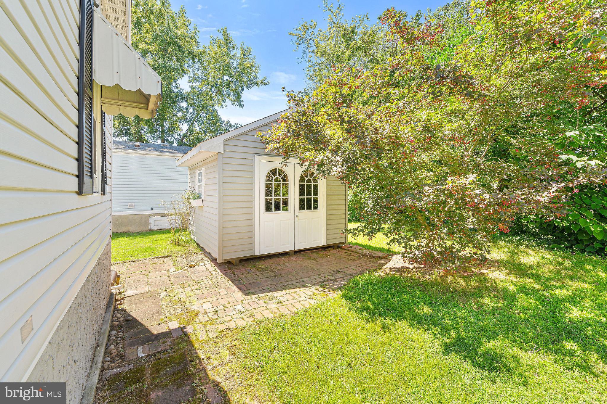 155 Whippoorwill Way Mantua, NJ 08051 - Photo 4 of 23 a view of a back yard of the house