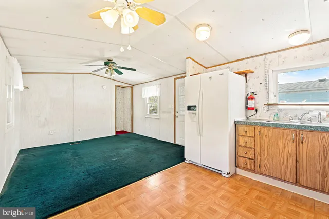 a view of a bathroom with a tub shower and a sink