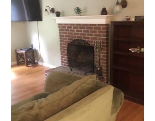 46 Fairview Park Road Sturbridge, MA 01566 - Photo 13 of 30 a living room with furniture and a fireplace