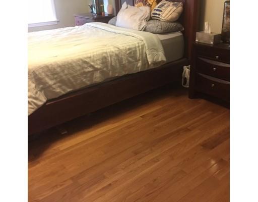 46 Fairview Park Road Sturbridge, MA 01566 - Photo 19 of 30 a bed sitting in a bedroom next to a window