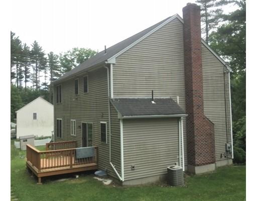 46 Fairview Park Road Sturbridge, MA 01566 - Photo 2 of 30 a front view of a house with garden
