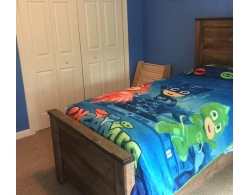 46 Fairview Park Road Sturbridge, MA 01566 - Photo 23 of 30 a bedroom with a bed and a window