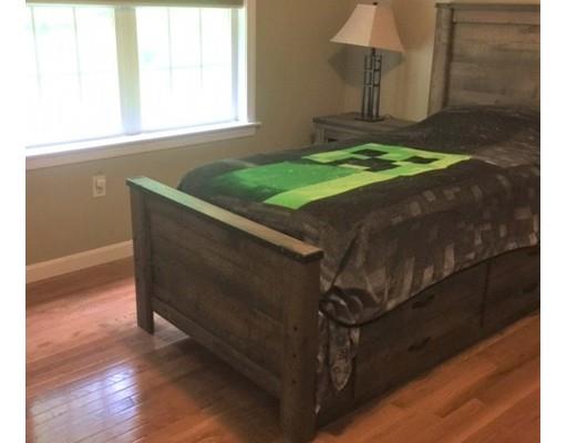 46 Fairview Park Road Sturbridge, MA 01566 - Photo 24 of 30 a room with a wooden floor and a window