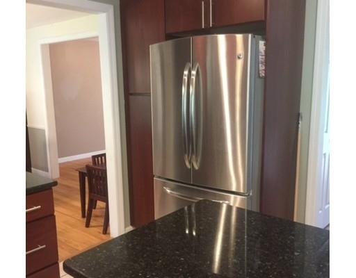 46 Fairview Park Road Sturbridge, MA 01566 - Photo 5 of 30 a view of a kitchen from a hallway
