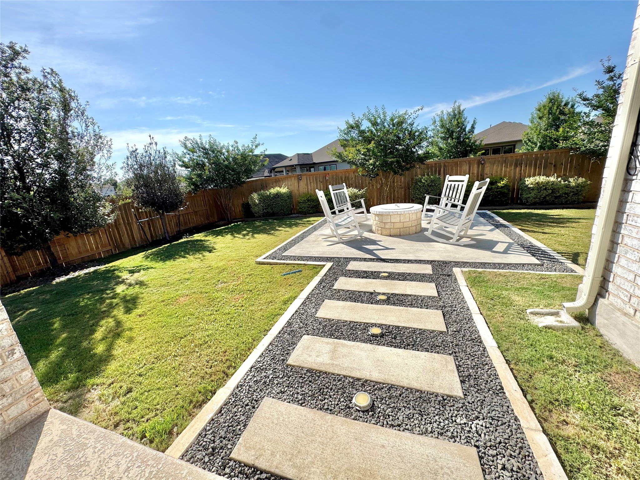 561 Cold Riv Run Kyle, TX 78640 - Photo 24 of 33 a view of a backyard with sitting area