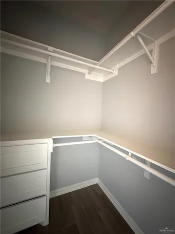 a view of an empty walk in closet