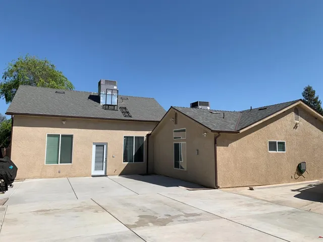 a front view of a house with a garage