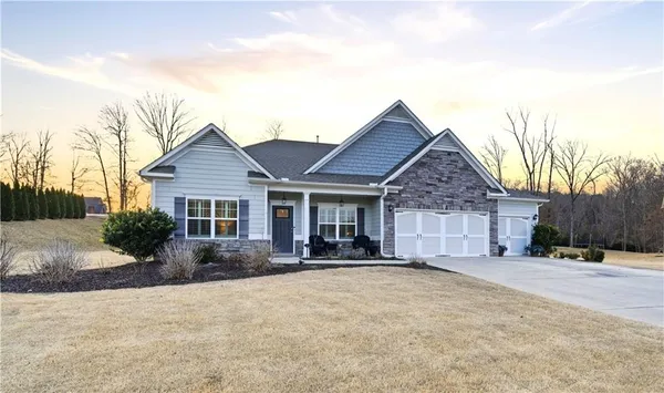 front view of a house with a yard
