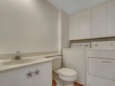 1403 14th Court Jupiter, FL 33477 - Photo 11 of 25 a bathroom with a sink and a toilet