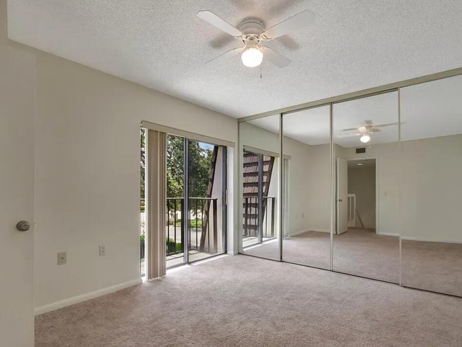 1403 14th Court Jupiter, FL 33477 - Photo 13 of 25 a view of an empty room with a window