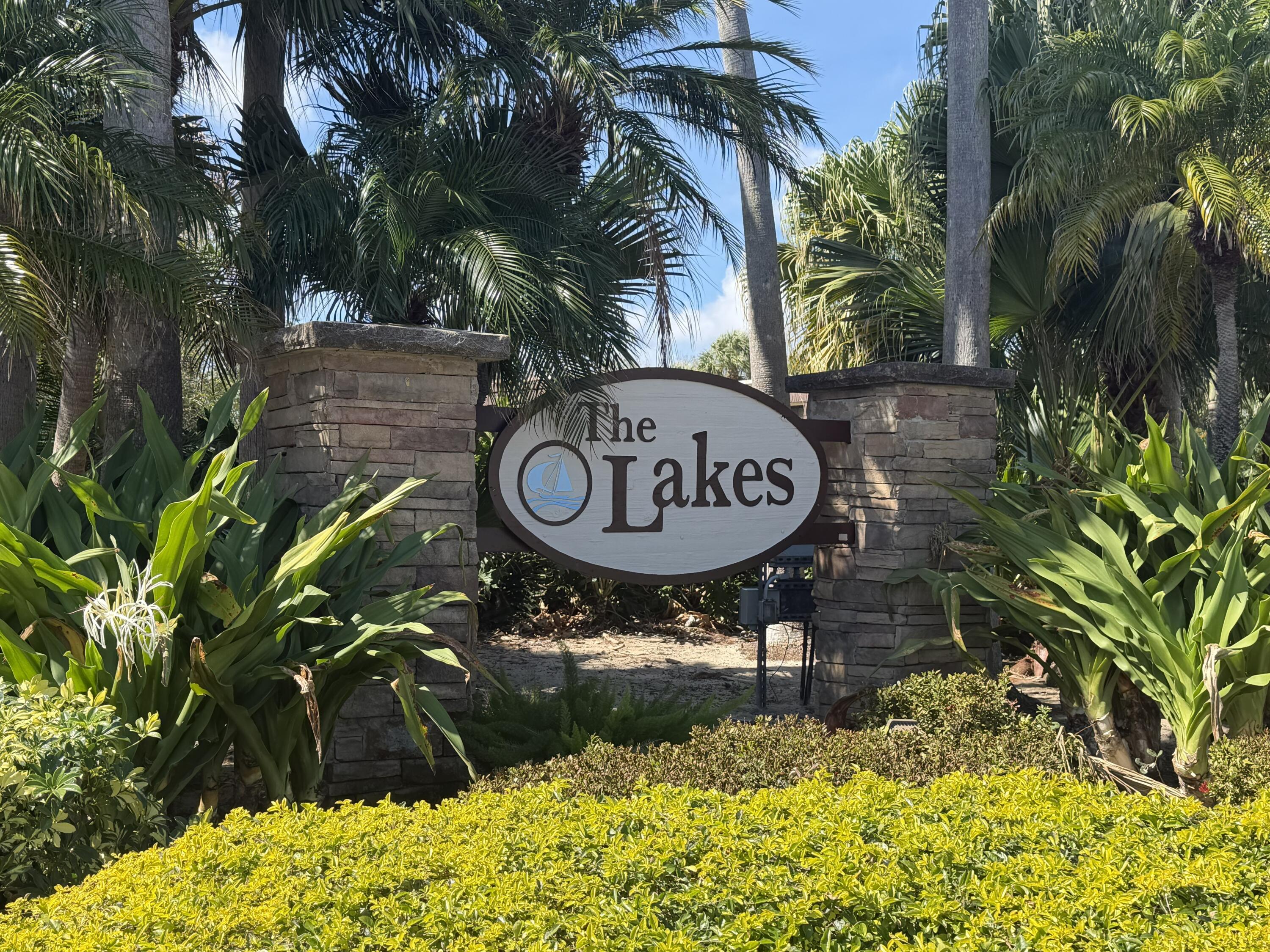 1403 14th Court Jupiter, FL 33477 - Photo 2 of 25 a view of a sign of a park