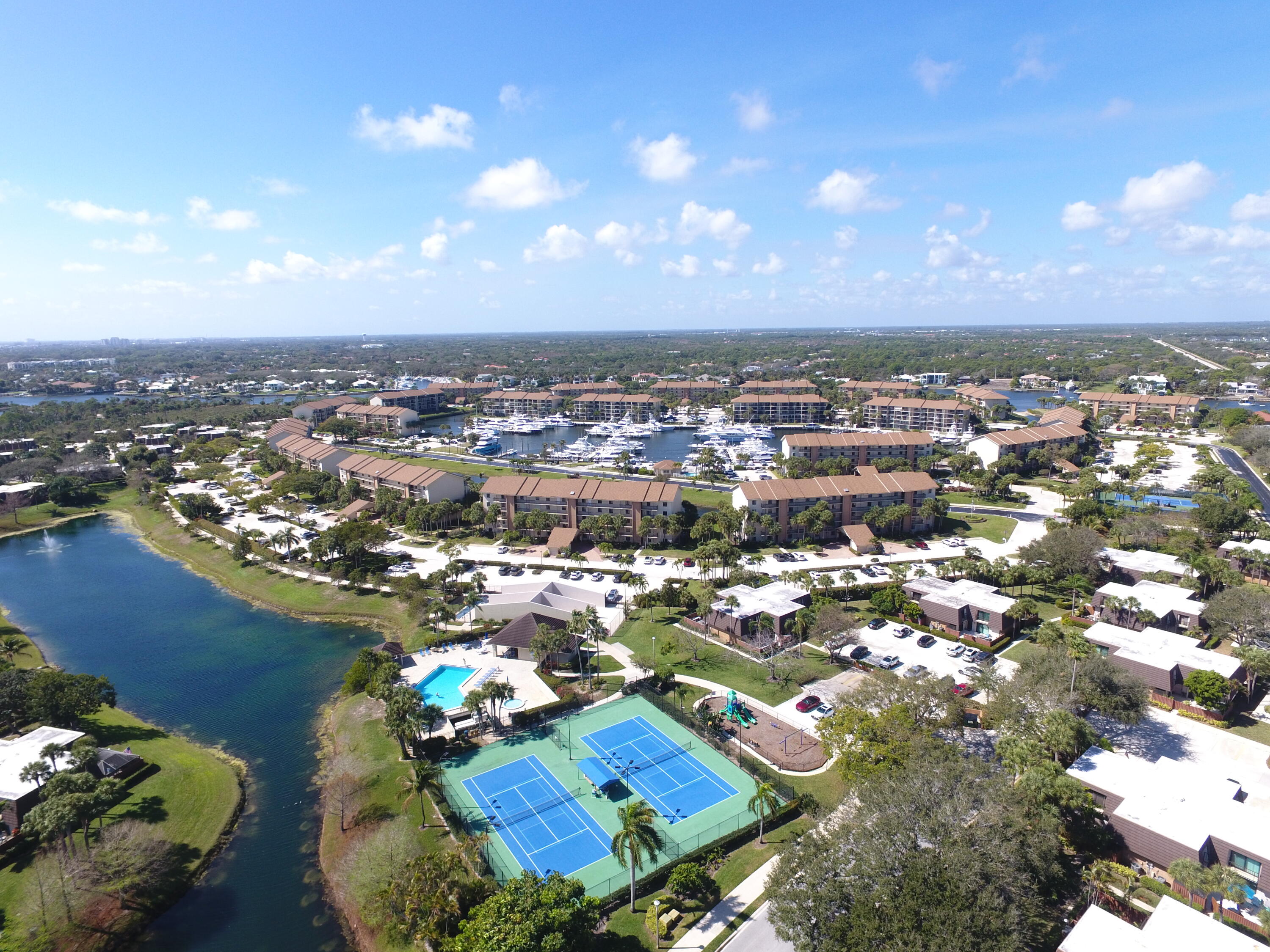 1403 14th Court Jupiter, FL 33477 - Photo 21 of 25 an aerial view of a city