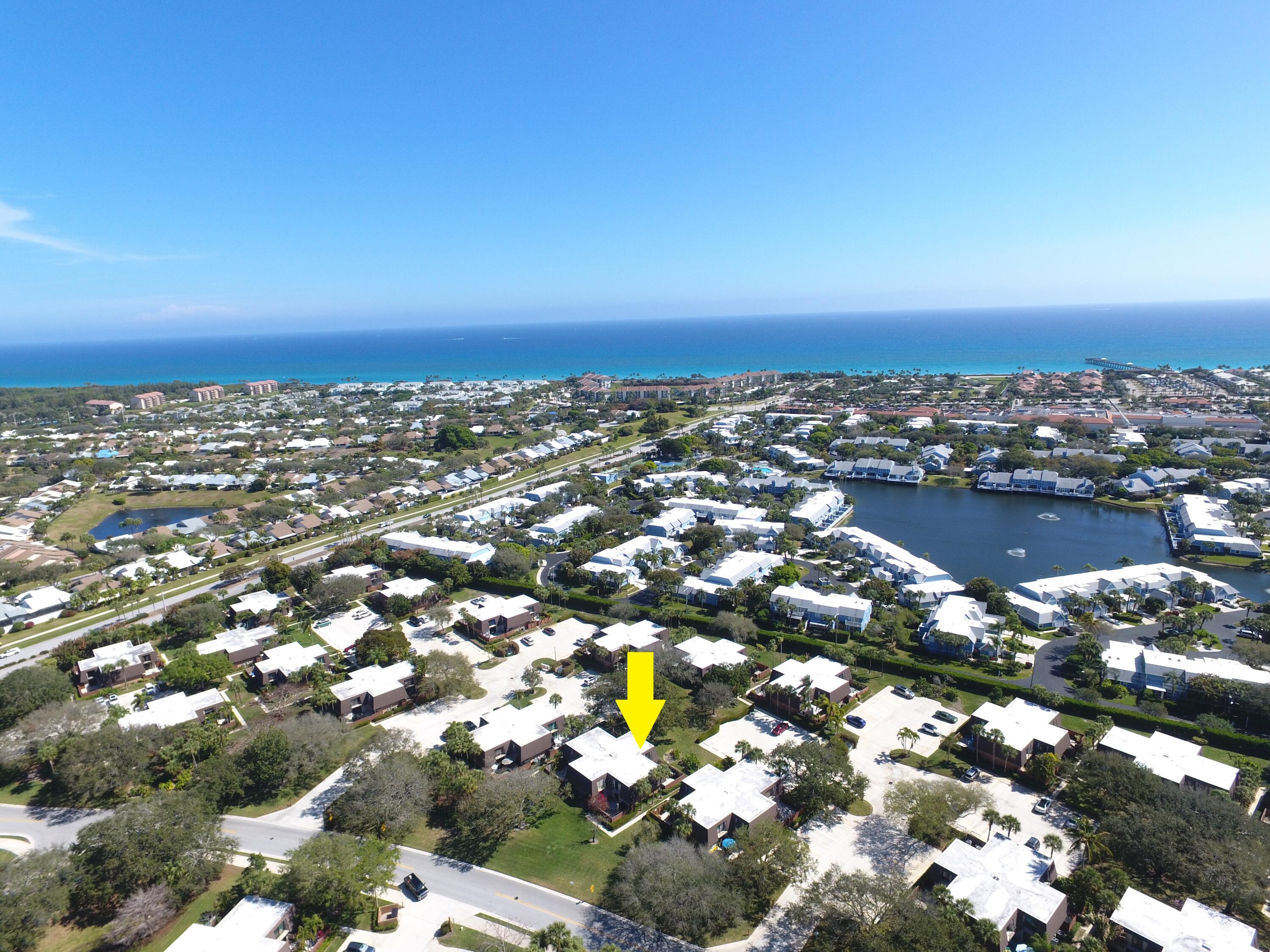 1403 14th Court Jupiter, FL 33477 - Photo 3 of 25 an aerial view of a city