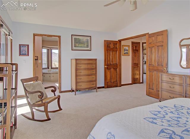 1165 Bowstring Road Monument, CO 80132 - Photo 17 of 27 Master bedroom is spacious and has double doors.